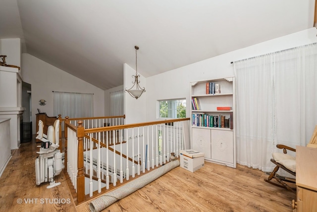 601 Cary Woods Cir Unit 601, Cary, IL 60013 - interior space with wood finished floors, an upstairs landing, and vaulted ceiling