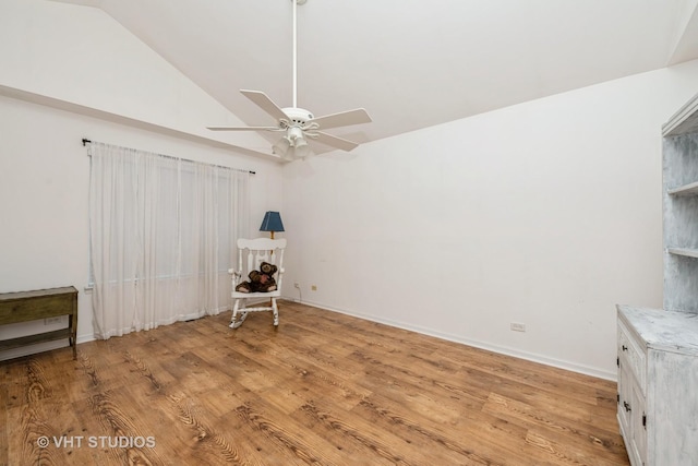 601 Cary Woods Cir Unit 601, Cary, IL 60013 - unfurnished bedroom with lofted ceiling, light wood-style floors, and ceiling fan