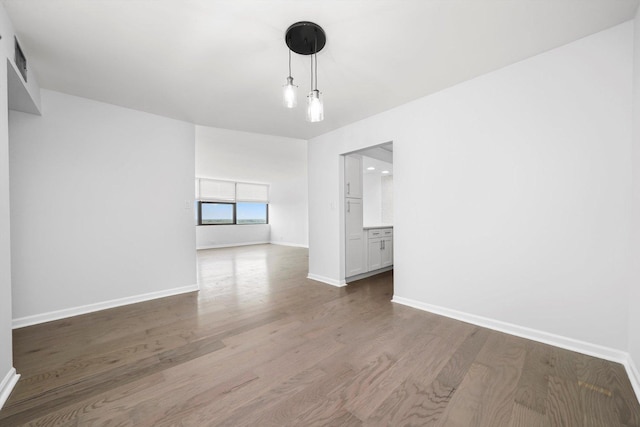 7234 W N Ave Unit 1806, Elmwood Park, IL 60707 - empty room with wood finished floors and baseboards