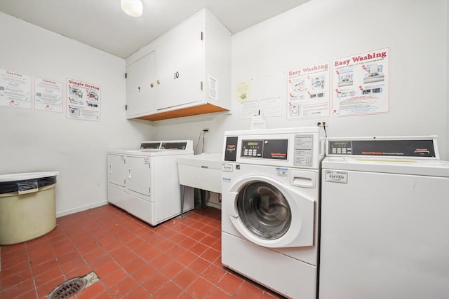 7234 W N Ave Unit 1806, Elmwood Park, IL 60707 - laundry area with cabinet space, washer and dryer, and tile patterned floors