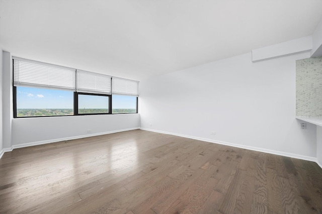 7234 W N Ave Unit 1806, Elmwood Park, IL 60707 - unfurnished room featuring wood finished floors and baseboards