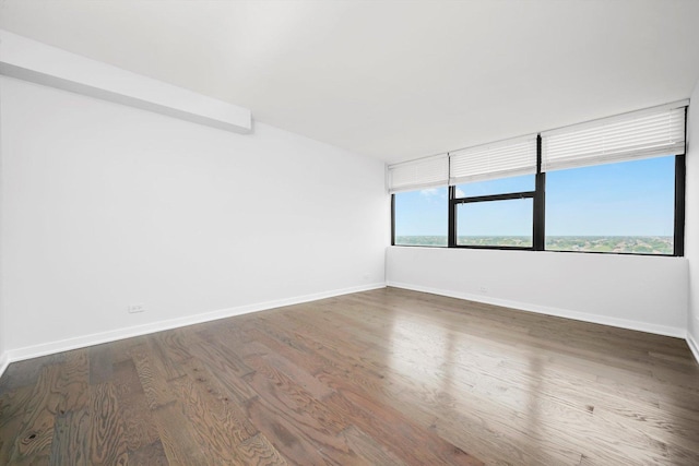 7234 W N Ave Unit 1806, Elmwood Park, IL 60707 - unfurnished room with baseboards and wood finished floors