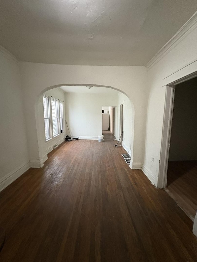 5604 S Morgan St, Chicago, IL 60621 - unfurnished room with arched walkways and wood finished floors
