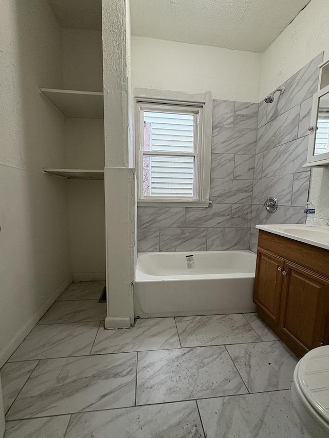 5604 S Morgan St, Chicago, IL 60621 - bathroom with marble finish flooring, vanity, and plenty of natural light