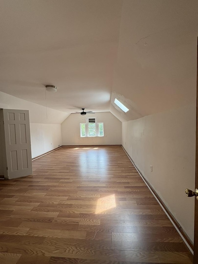 5604 S Morgan St, Chicago, IL 60621 - additional living space featuring vaulted ceiling and wood finished floors