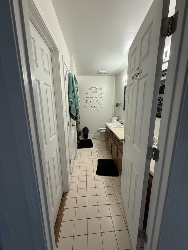 1208 E 154th St, South Holland, IL 60473 - bathroom with tile patterned floors and vanity