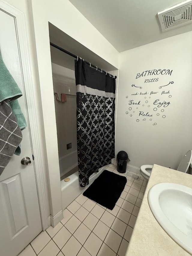 1208 E 154th St, South Holland, IL 60473 - bathroom featuring tile patterned floors, vanity, and shower / bathtub combination with curtain