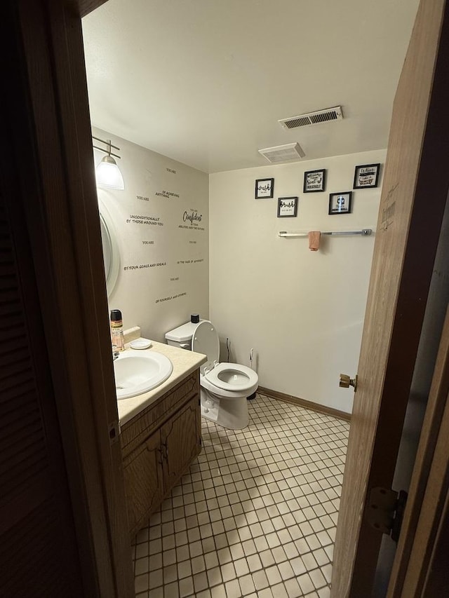 1208 E 154th St, South Holland, IL 60473 - half bathroom with vanity and tile patterned floors