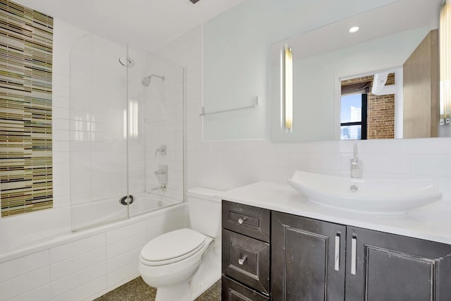 1322 S Wabash Ave Unit 807, Chicago, IL 60605 - full bath with tiled shower / bath, vanity, tile walls, and recessed lighting