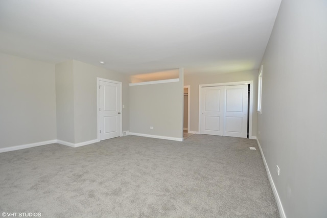 816 Blackhawk Dr, University Park, IL 60484 - spare room featuring carpet and baseboards