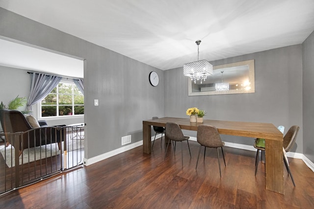 816 Blackhawk Dr, University Park, IL 60484 - dining space with wood finished floors and a chandelier