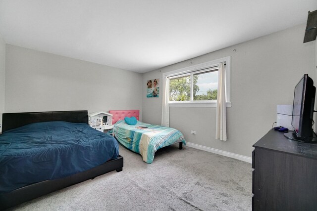 816 Blackhawk Dr, University Park, IL 60484 - carpeted bedroom featuring baseboards