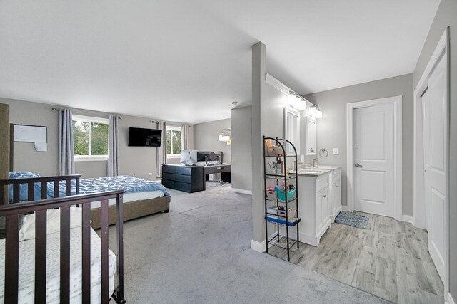 816 Blackhawk Dr, University Park, IL 60484 - bedroom with an office area and light colored carpet