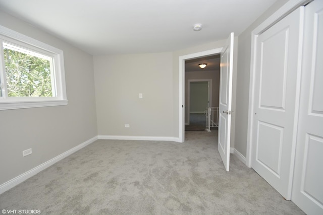 816 Blackhawk Dr, University Park, IL 60484 - unfurnished bedroom with light carpet and baseboards