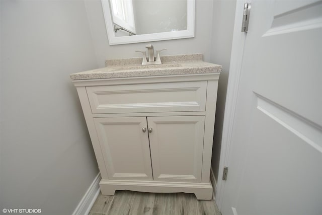 816 Blackhawk Dr, University Park, IL 60484 - bathroom view of vanity and wood finished floors