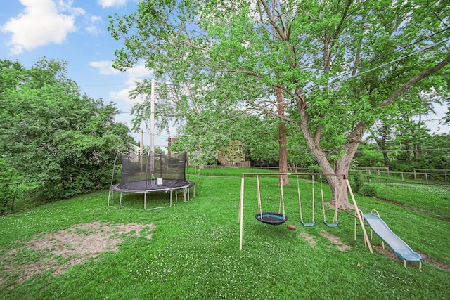 816 Blackhawk Dr, University Park, IL 60484 - view of yard featuring a trampoline