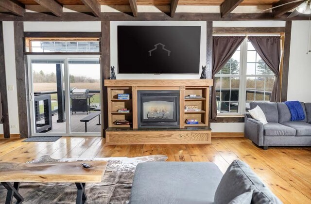 9439 Corneils Rd, Bristol, IL 60512 - living area with beam ceiling, hardwood / wood-style flooring, and beverage cooler