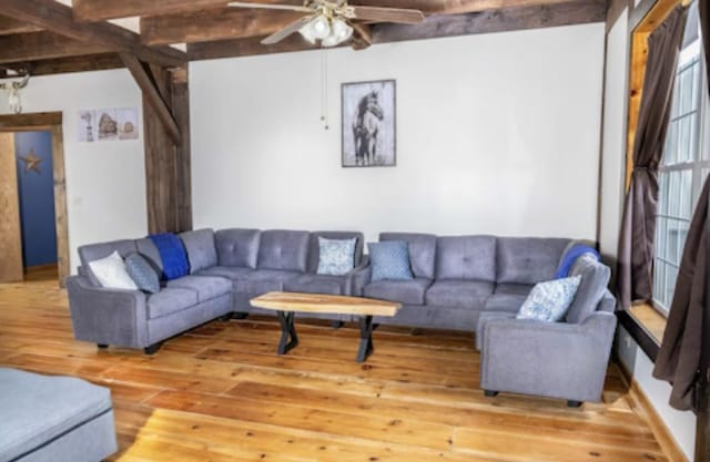 9439 Corneils Rd, Bristol, IL 60512 - living room featuring wood finished floors, ceiling fan, and beamed ceiling