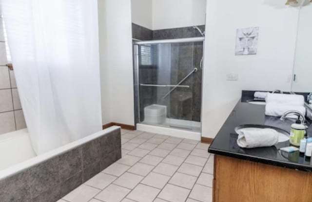9439 Corneils Rd, Bristol, IL 60512 - bathroom with vanity and tile patterned flooring