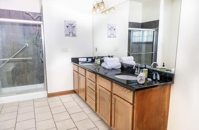 9439 Corneils Rd, Bristol, IL 60512 - full bath featuring double vanity, a stall shower, and tile patterned floors