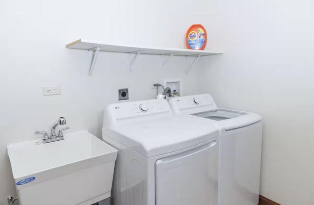 9439 Corneils Rd, Bristol, IL 60512 - laundry room with washer and clothes dryer