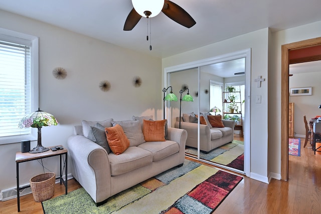 9353 Ewing Ave, Evanston, IL 60203 - living area with a ceiling fan and wood finished floors