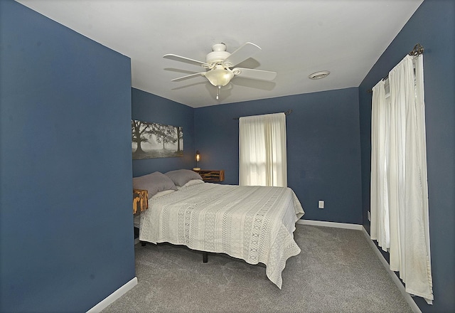 1107 W Lafayette St, Ottawa, IL 61350 - carpeted bedroom featuring baseboards and ceiling fan