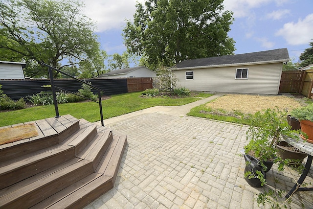 1107 W Lafayette St, Ottawa, IL 61350 - fenced backyard with a patio