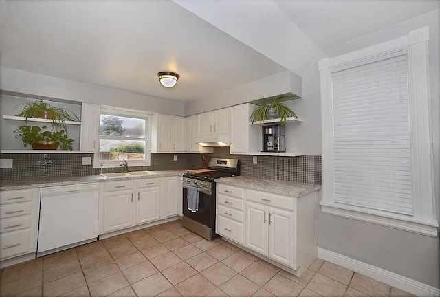 1107 W Lafayette St, Ottawa, IL 61350 - kitchen featuring open shelves, stainless steel gas range oven, white dishwasher, light tile patterned floors, and decorative backsplash