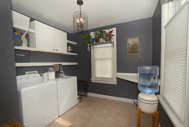 1107 W Lafayette St, Ottawa, IL 61350 - washroom with cabinet space, washer and clothes dryer, and light tile patterned flooring