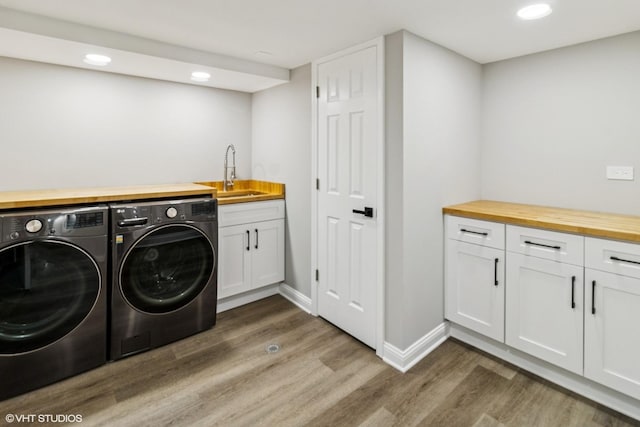 524 Willow St, Itasca, IL 60143 - laundry room featuring washing machine and clothes dryer, wood finished floors, wet bar, recessed lighting, and cabinet space