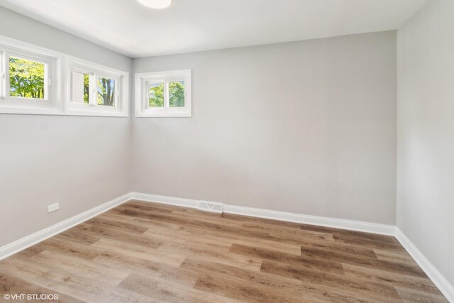 524 Willow St, Itasca, IL 60143 - empty room with baseboards and light wood-style flooring