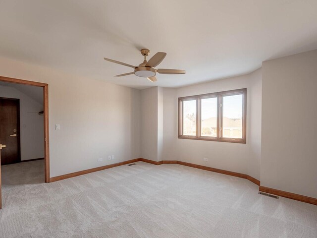 501 Bryan Trl, New Lenox, IL 60451 - spare room with a ceiling fan and light colored carpet