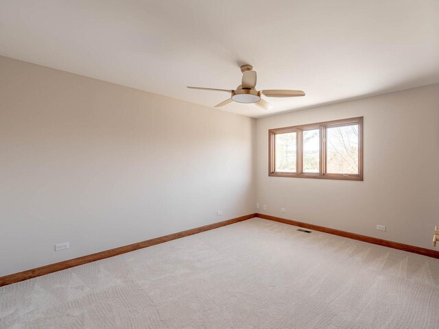 501 Bryan Trl, New Lenox, IL 60451 - spare room featuring ceiling fan and light colored carpet