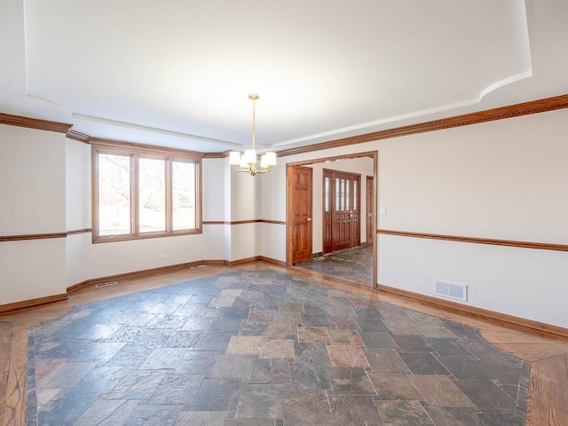 501 Bryan Trl, New Lenox, IL 60451 - unfurnished room featuring a chandelier, stone tile flooring, and ornamental molding
