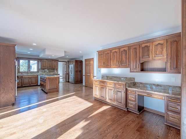 501 Bryan Trl, New Lenox, IL 60451 - kitchen featuring stainless steel fridge, dark wood finished floors, a kitchen island, backsplash, and recessed lighting