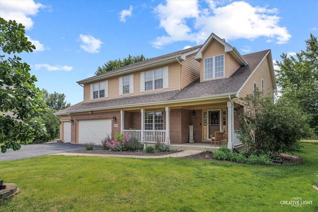 16260 W Mohawk Ct, Lockport, IL 60441 - traditional-style home featuring covered porch, driveway, a front lawn, an attached garage, and brick siding