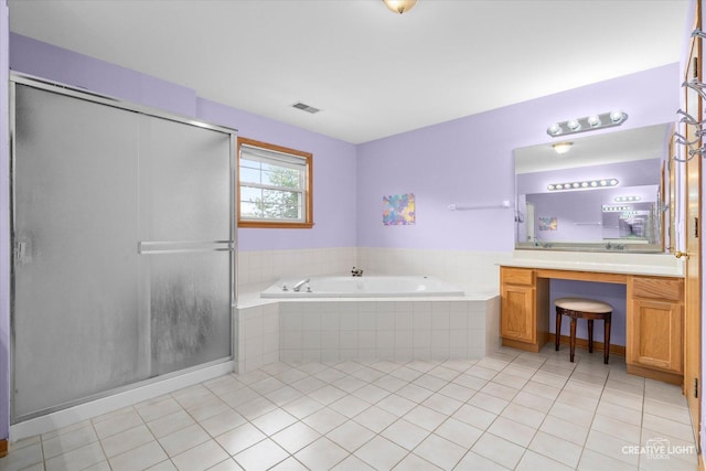 16260 W Mohawk Ct, Lockport, IL 60441 - bathroom with vanity, a bath, tile patterned floors, and a stall shower