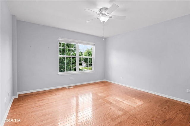 13311 Morning Mist Pl, Plainfield, IL 60585 - unfurnished room featuring light wood finished floors and a ceiling fan