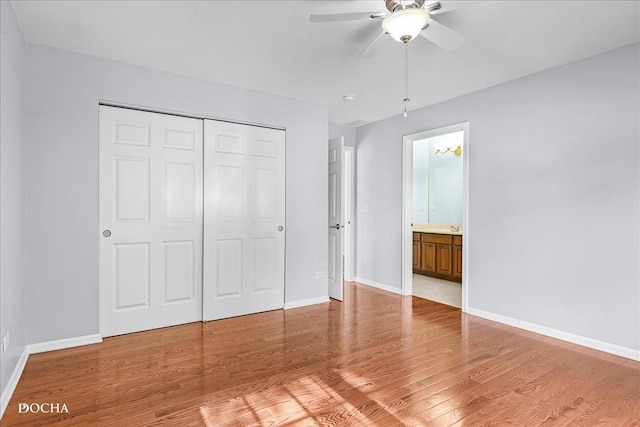 13311 Morning Mist Pl, Plainfield, IL 60585 - unfurnished bedroom with wood finished floors, a closet, and ceiling fan