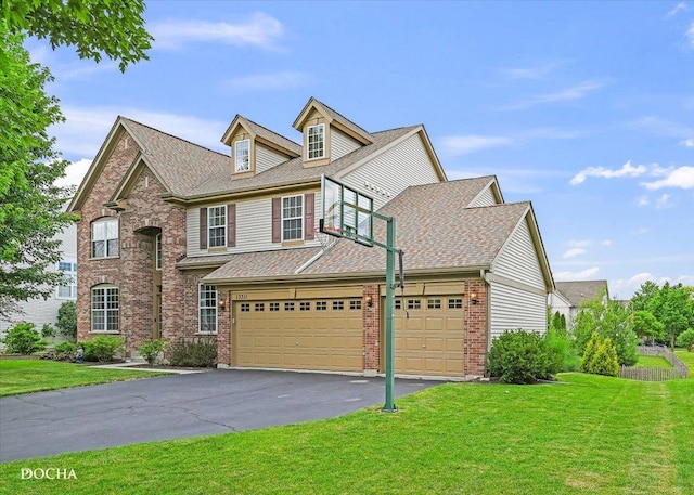 13311 Morning Mist Pl, Plainfield, IL 60585 - view of front facade featuring driveway, a front lawn, brick siding, an attached garage, and a shingled roof