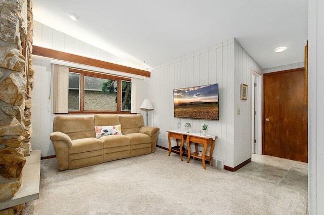 440 E Walnut St, Roselle, IL 60172 - carpeted living room featuring lofted ceiling and wooden walls