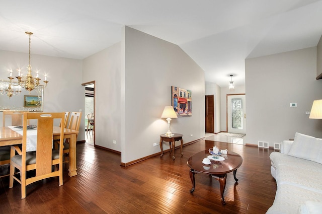 440 E Walnut St, Roselle, IL 60172 - living room with lofted ceiling, wood finished floors, and a chandelier
