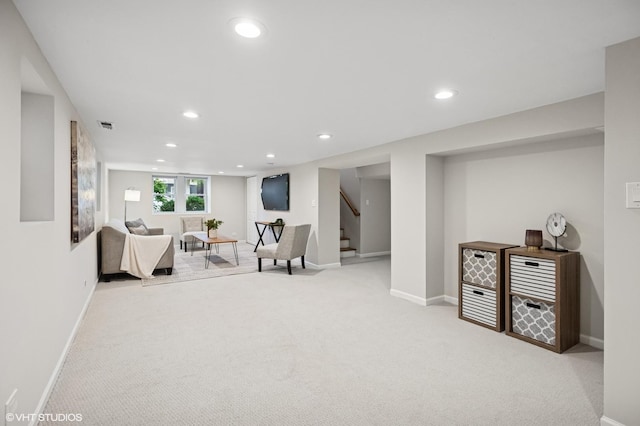 4848 N Seeley Ave, Chicago, IL 60625 - living room featuring carpet floors, recessed lighting, and stairs