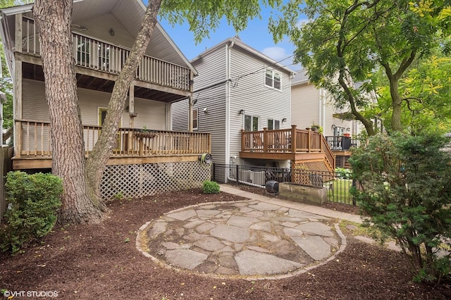 4848 N Seeley Ave, Chicago, IL 60625 - rear view of house featuring a balcony and a patio