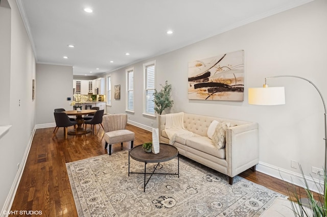 4848 N Seeley Ave, Chicago, IL 60625 - living area with crown molding, wood finished floors, and recessed lighting