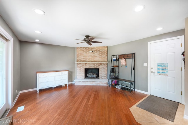 106 Grand Central Ln, Schaumburg, IL 60193 - living room featuring ceiling fan, wood finished floors, a brick fireplace, and recessed lighting