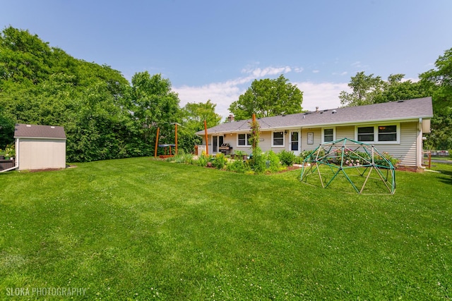 106 Grand Central Ln, Schaumburg, IL 60193 - view of grassy yard featuring a storage shed