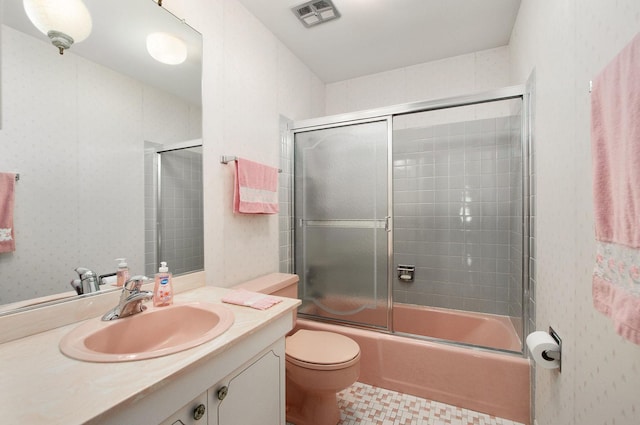2811 N Harvard Ave, Arlington Heights, IL 60004 - bathroom featuring vanity and bath / shower combo with glass door