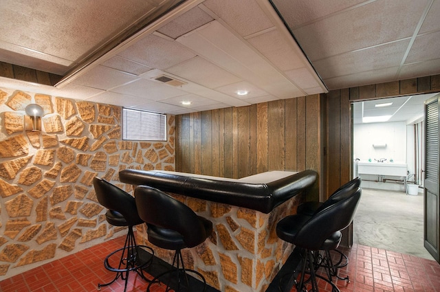 2811 N Harvard Ave, Arlington Heights, IL 60004 - indoor dry bar featuring a drop ceiling, brick patterned flooring, and wooden walls